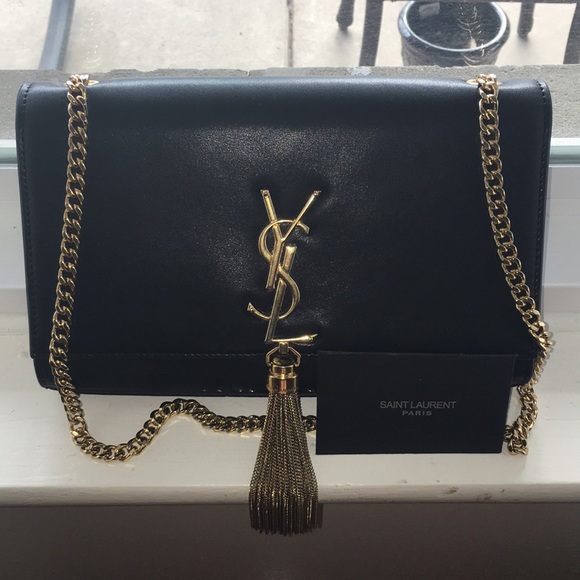 ysl tassel clutch